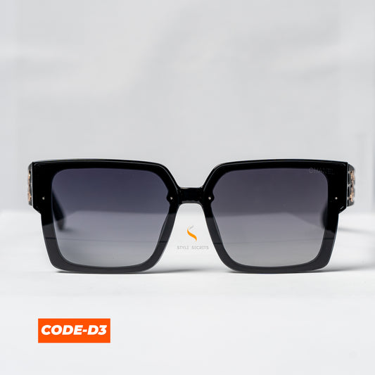 Chanel CODE-D3 sunglasses, showcasing a sleek, modern design with the iconic Chanel logo.

